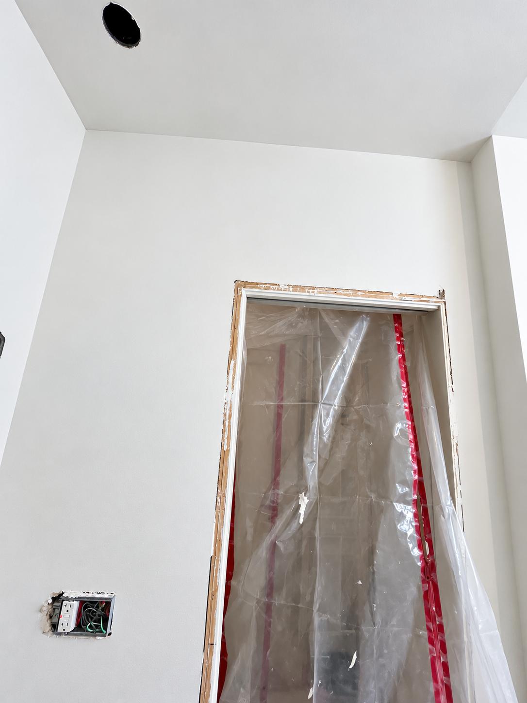 After: Drywall finishing above the doorway
